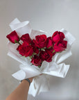 Ruby - Red Roses in White Wrapping - 14 Stalks