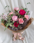 The Warm Mom bouquet styled close-up to show peony detail and colour blend