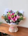 pink lily lilies hot pink rose bouquet