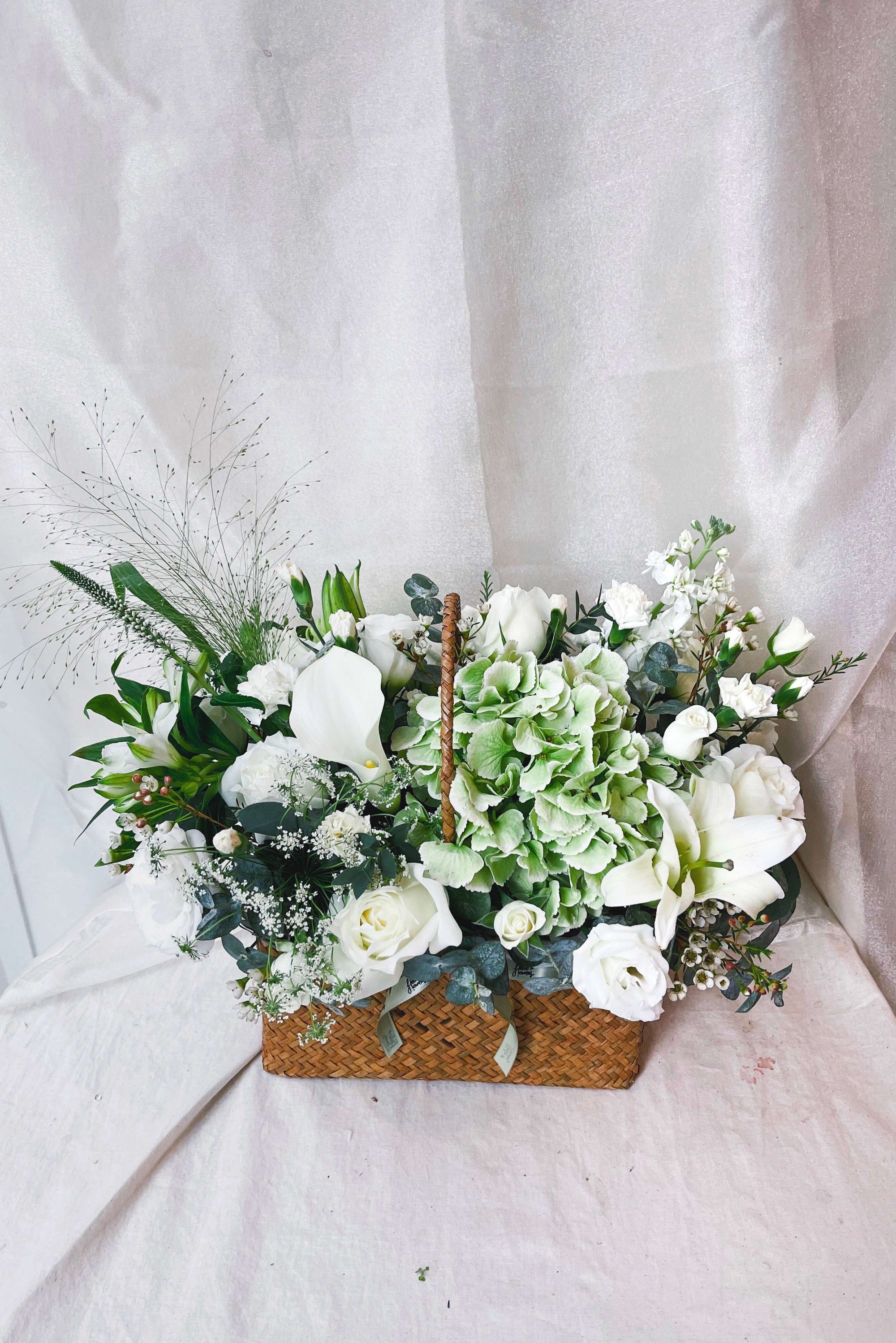 Flowers in wick basket