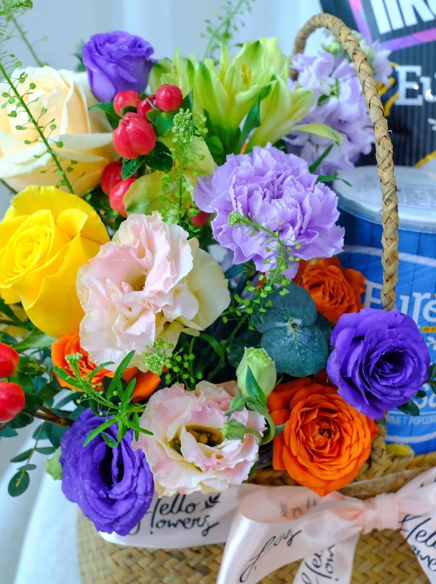 A close up shot of a bouquet of flowers in a hamper