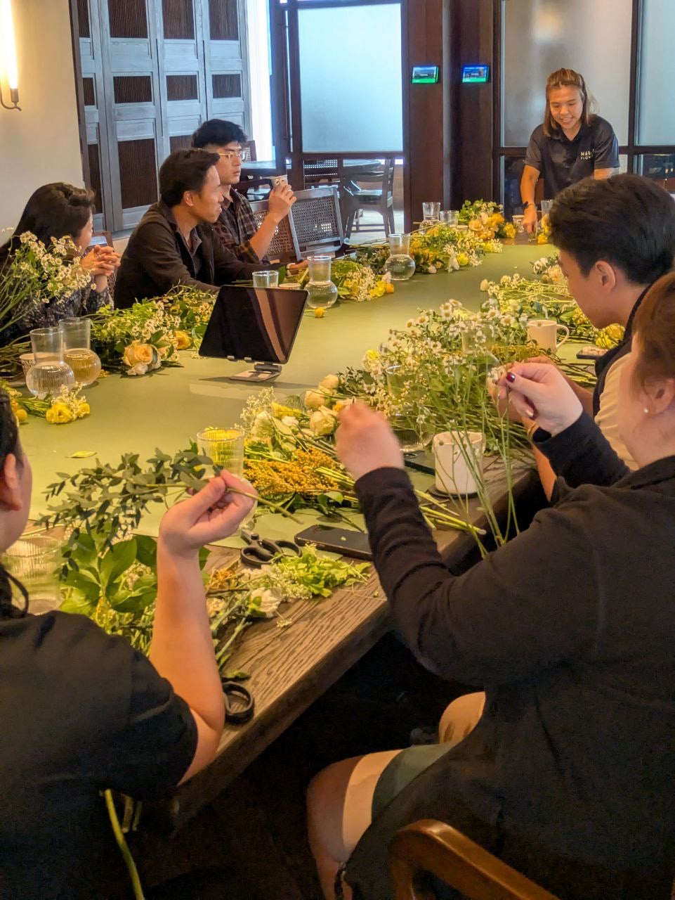 florist conducting a therapeutic floral workshop