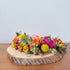 Fresh flower crown bridal hair accessory styled in soft tones