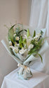 Laura white lily bouquet hand-tied in a clean palette