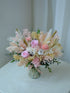 Willow Jar preserved arrangement in pink tones in a glass jar