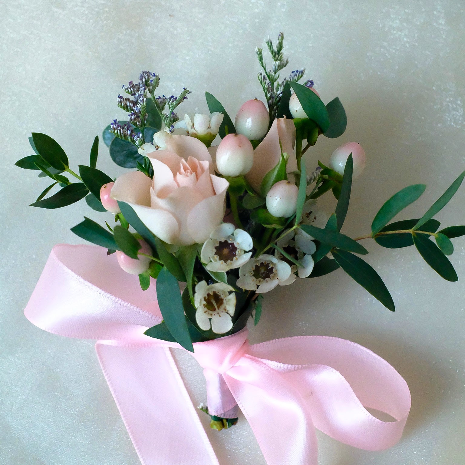 pink and white wrist corsage