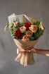 Mocha Rose bouquet with red and cappuccino roses and blue oxypetalum accents