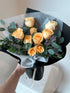 rose bouquet with dried lavender and eucalyptus leaves and black wrapping