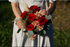 Red rose, caramel carnation and pampas bridal bouquet